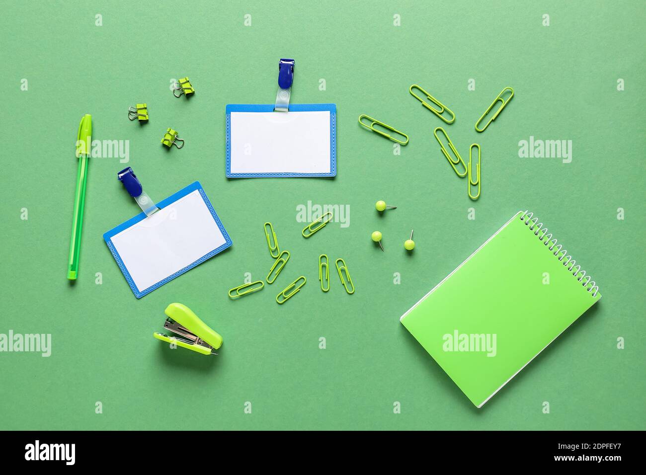 Blank badges and stationery on color background Stock Photo - Alamy
