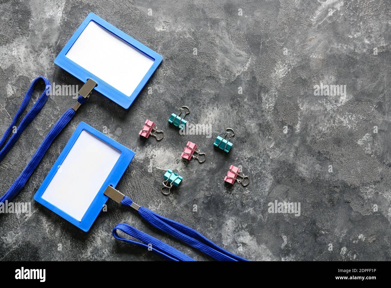 Blank badges and stationery on table Stock Photo - Alamy