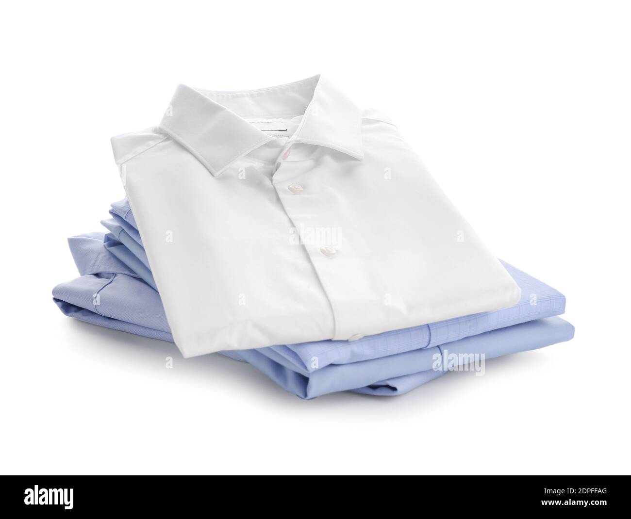 Stack of male shirts on white background Stock Photo - Alamy