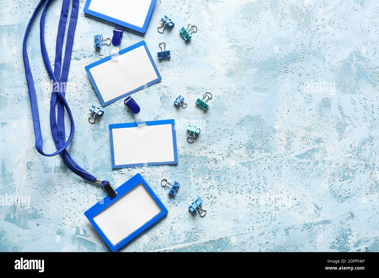Blank badges and stationery on color background Stock Photo - Alamy