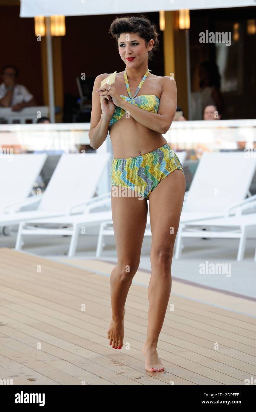 Model appears for a swimsuit retrospective in the Molitor runway show by  Mode City at the Molitor swimming pool (Piscine Molitor) in Paris, France  on July 05, 2015. Photo by Aurore Marechal/ABACAPRESS.COM