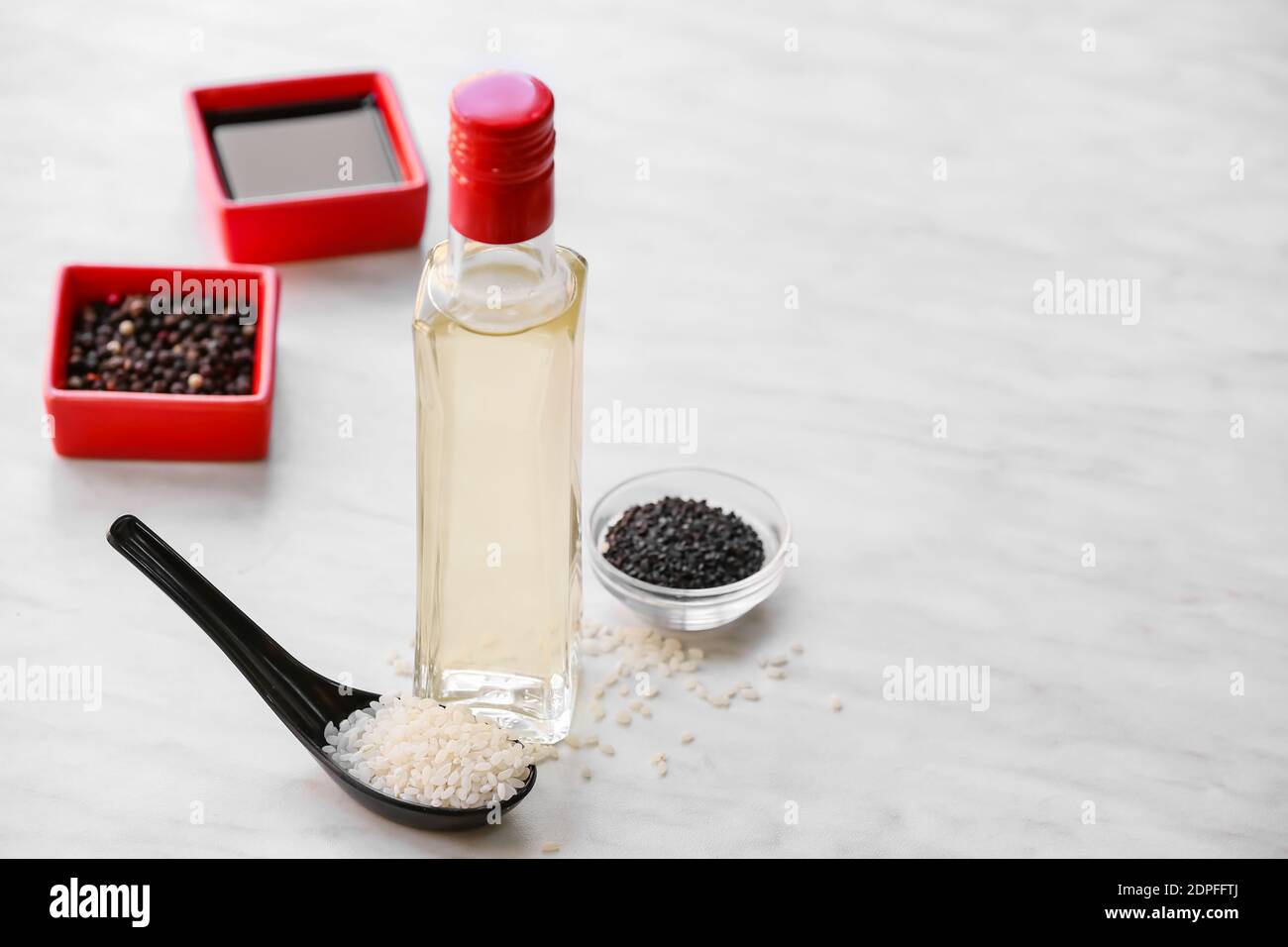 Composition with rice vinegar on table Stock Photo