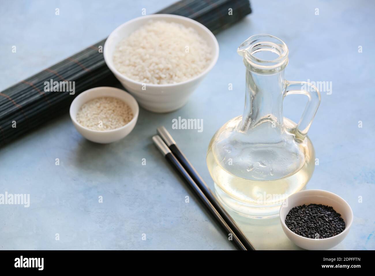 Composition with rice vinegar on table Stock Photo