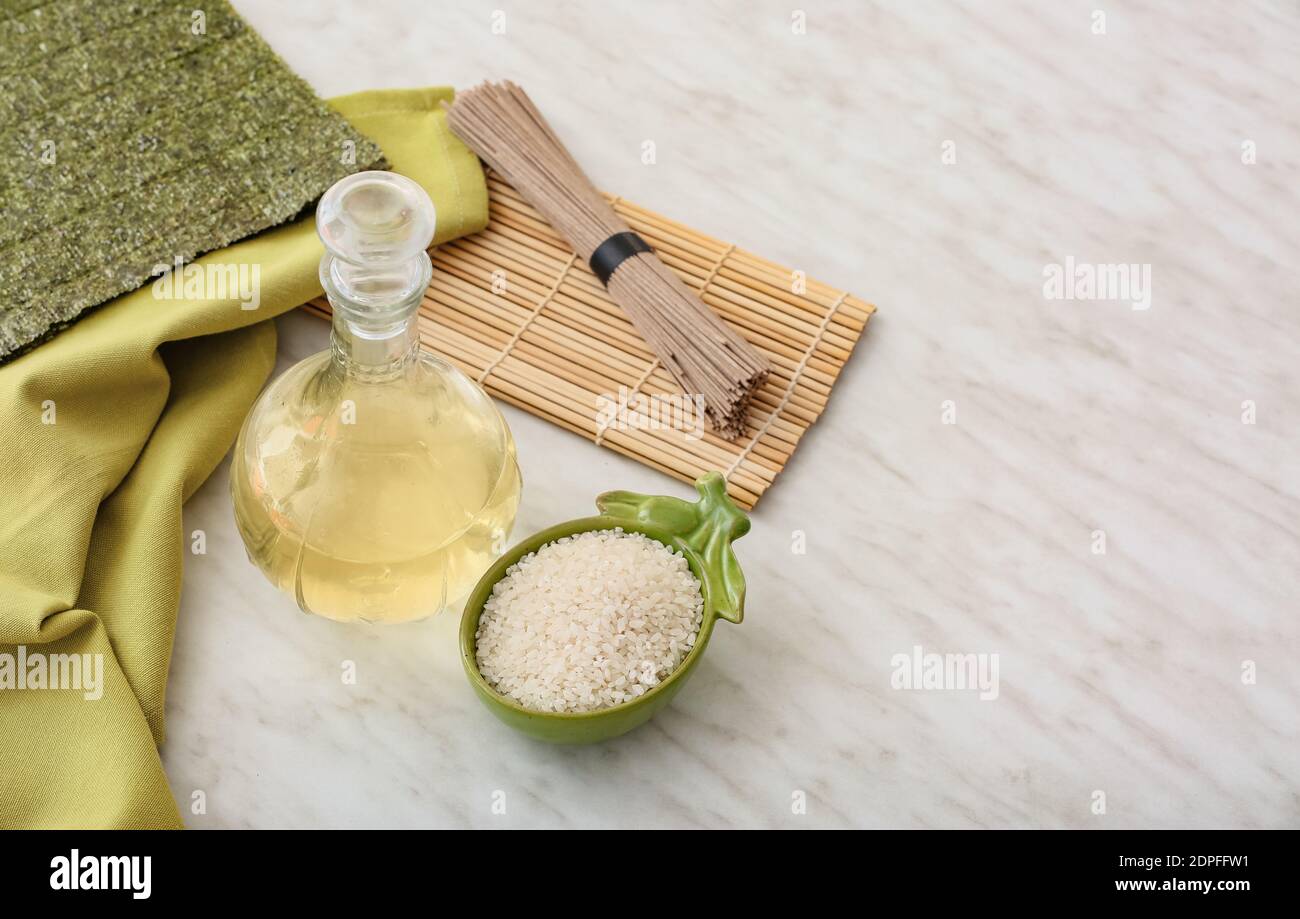 Composition with rice vinegar on table Stock Photo