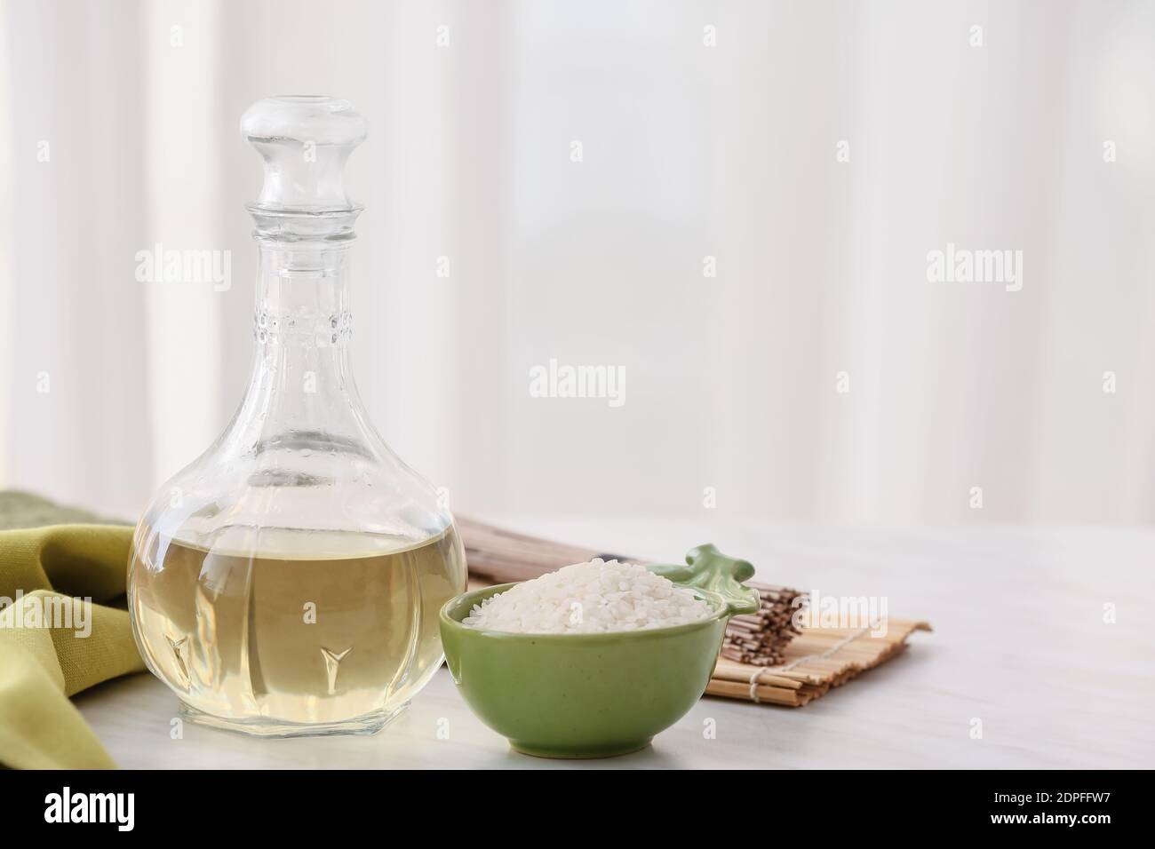 Composition with rice vinegar on table Stock Photo Alamy