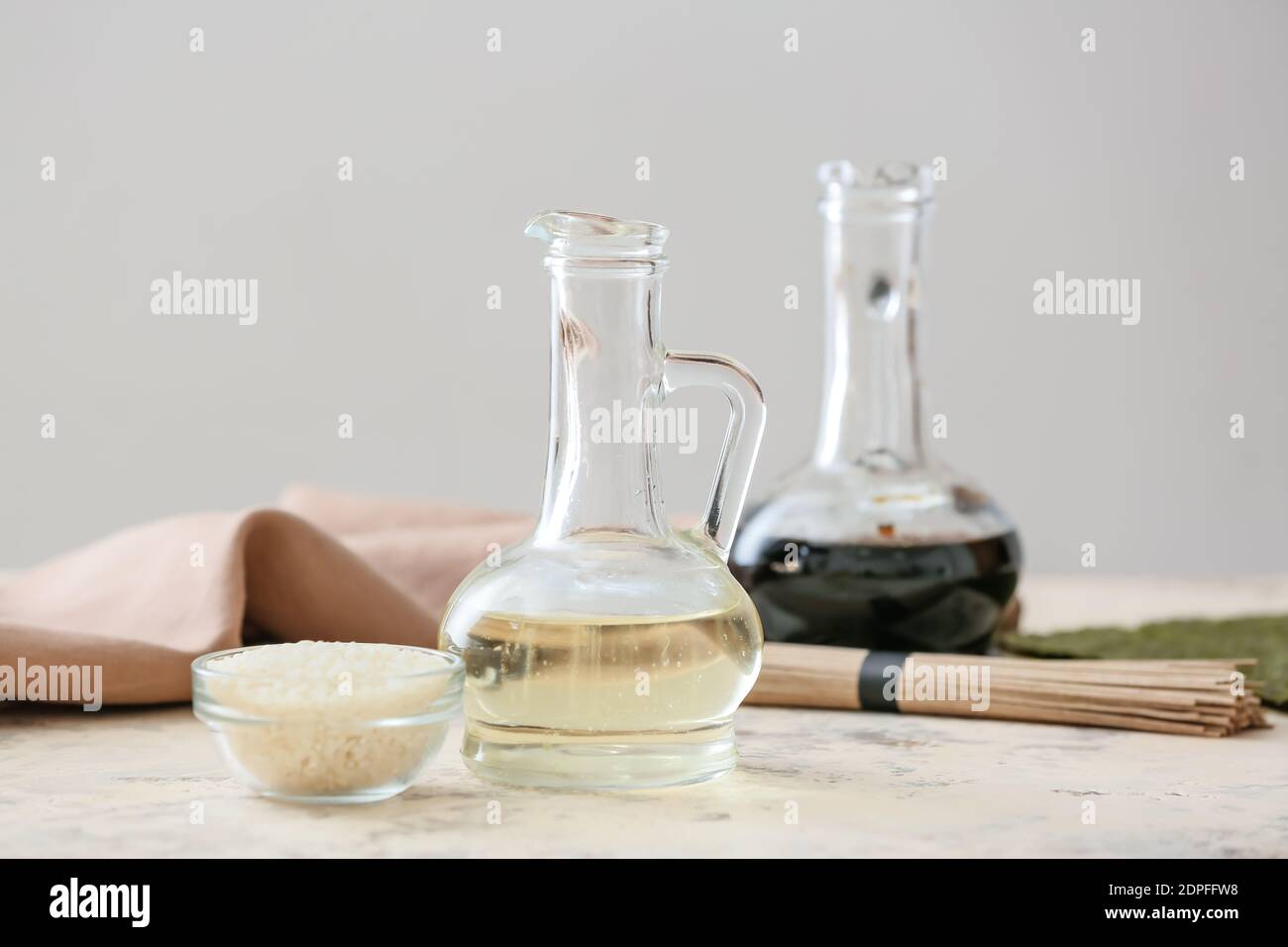 Composition with rice vinegar on table Stock Photo Alamy