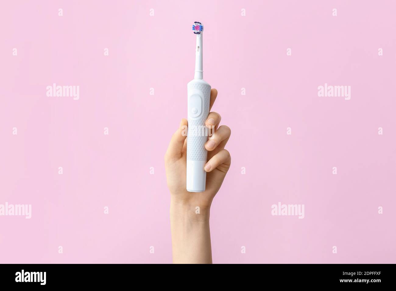 Electric toothbrush on color hi-res stock photography and images - Alamy