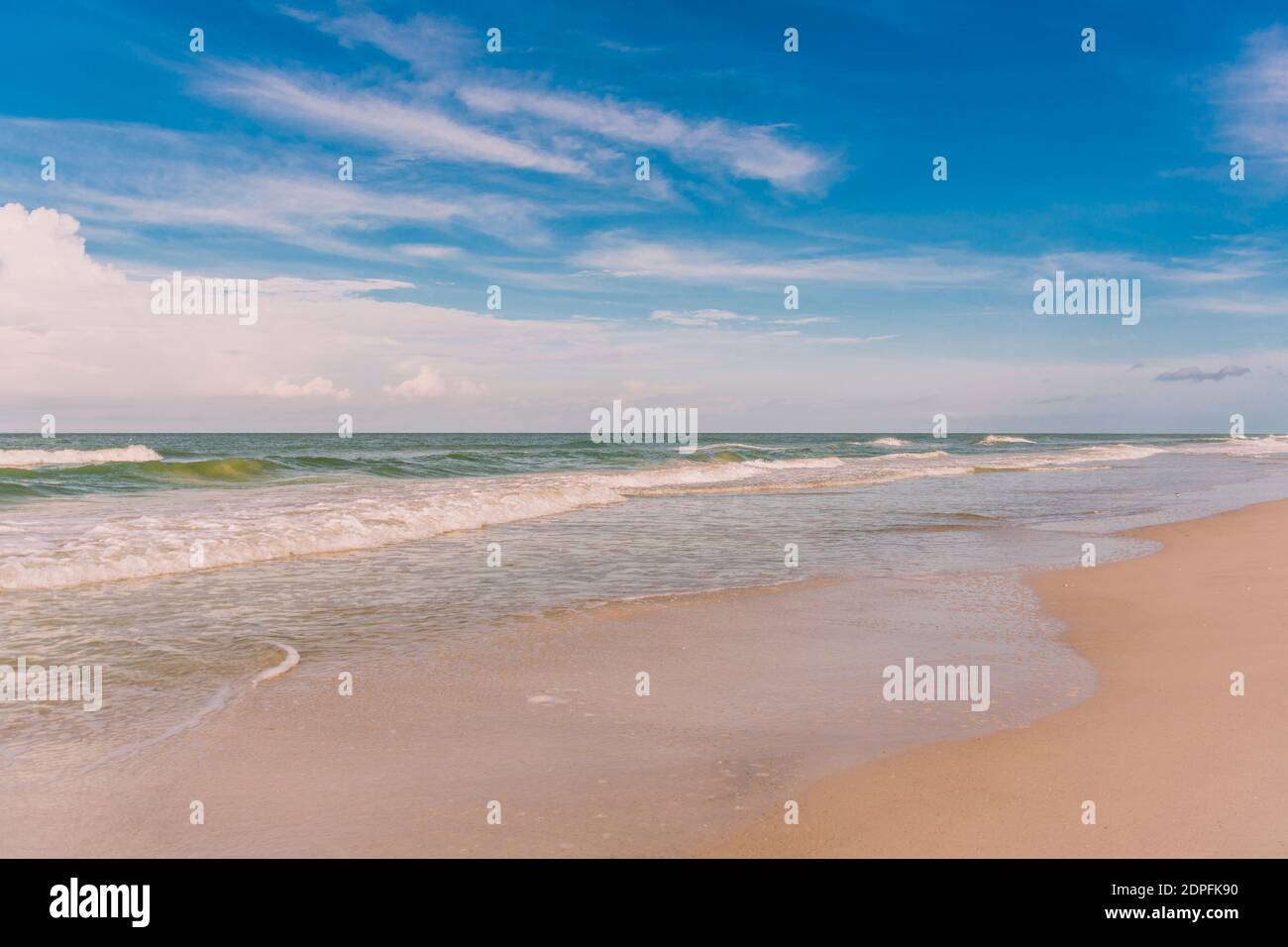 Waves gently caress the beach at St Petersburg Beach on Florida's Gulf Coast Stock Photo