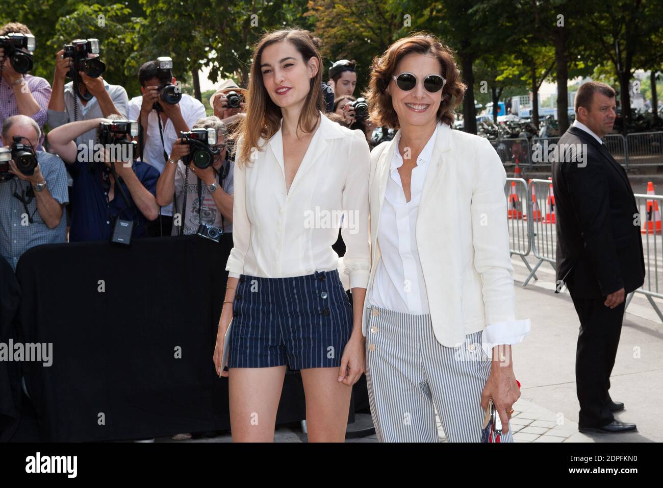 Ines De La Fressange and her daughter attending Chanel's Fall-Winter