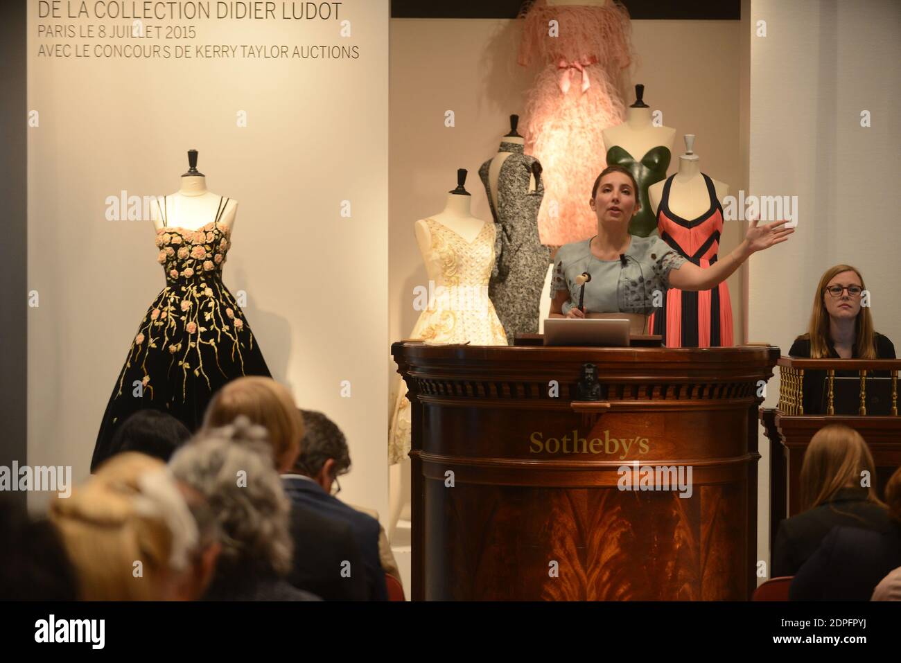 Auctioneer Camille de Foresta, from Sotheby's Paris seen during the house's  first auction of Haute Couture, which gathered some 170 items from the  private collection of Didier Ludot, and was sold for