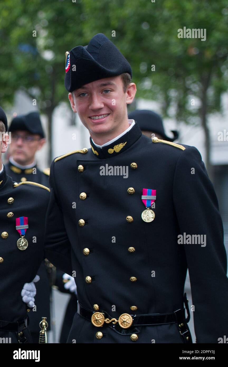Frederic Arnault, son of French luxury group LVMH Chairman and CEO Bernard  Arnault, a student at French military academy Ecole Polytechnique, is  pictured on the Champs-Elysees prior to participate in the 2015