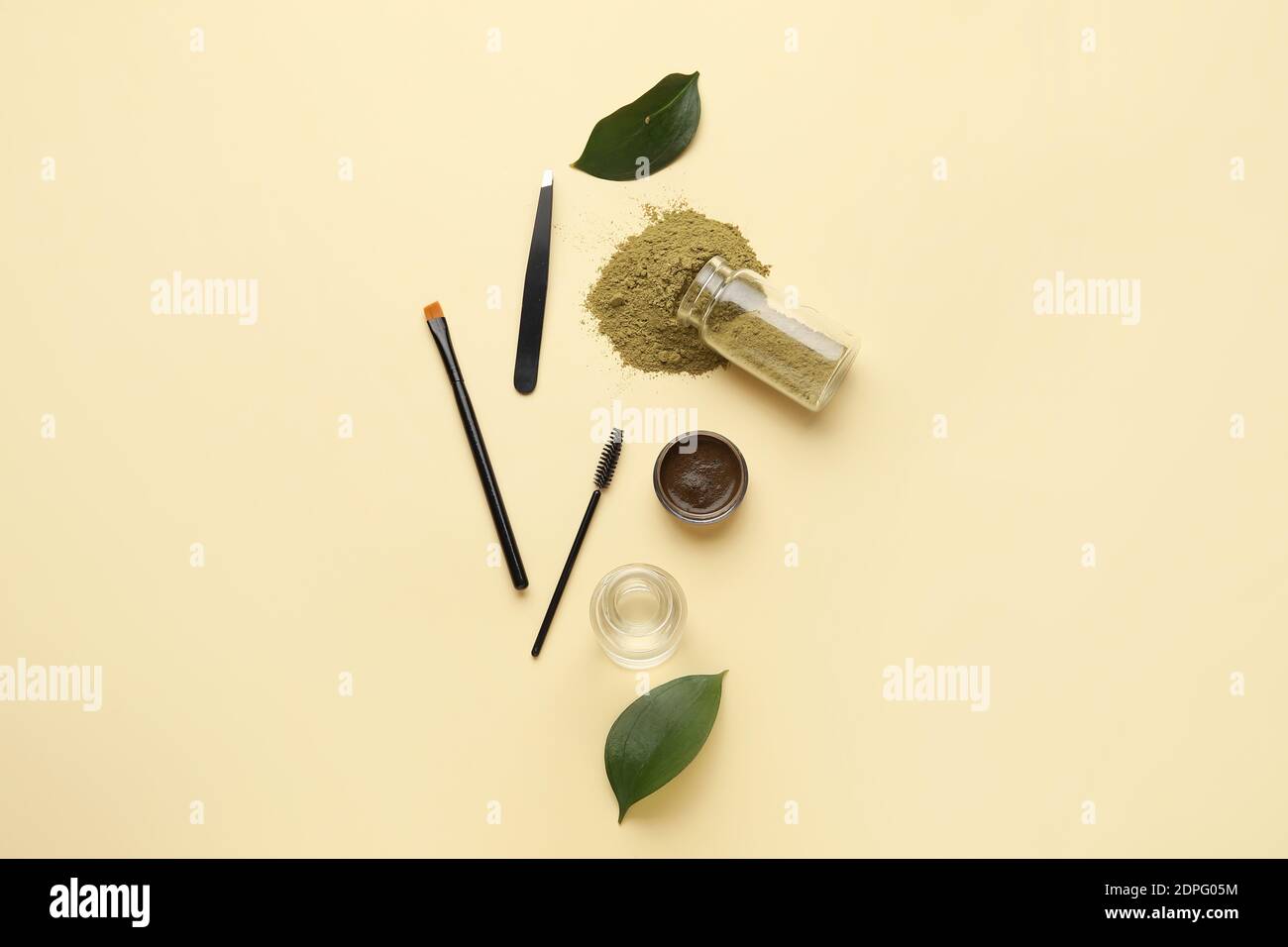 Composition with henna for eyebrows correction on color background Stock Photo