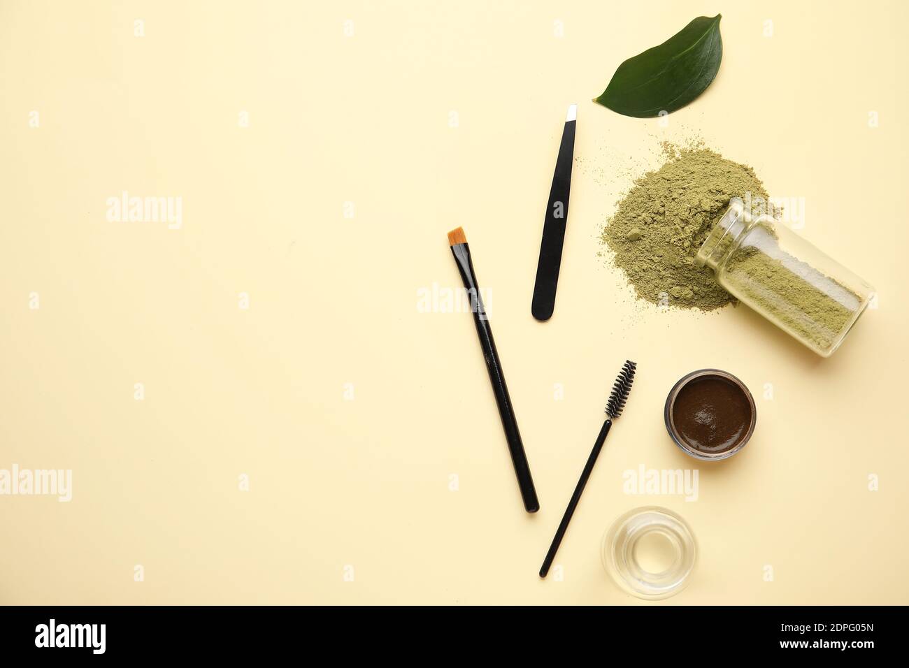 Composition with henna for eyebrows correction on color background Stock Photo