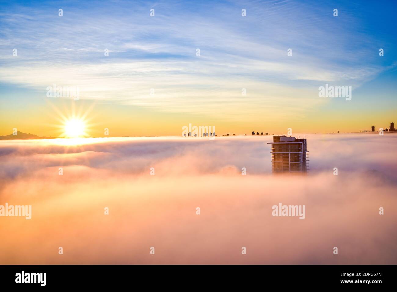 Sunrise above the cloud Stock Photo