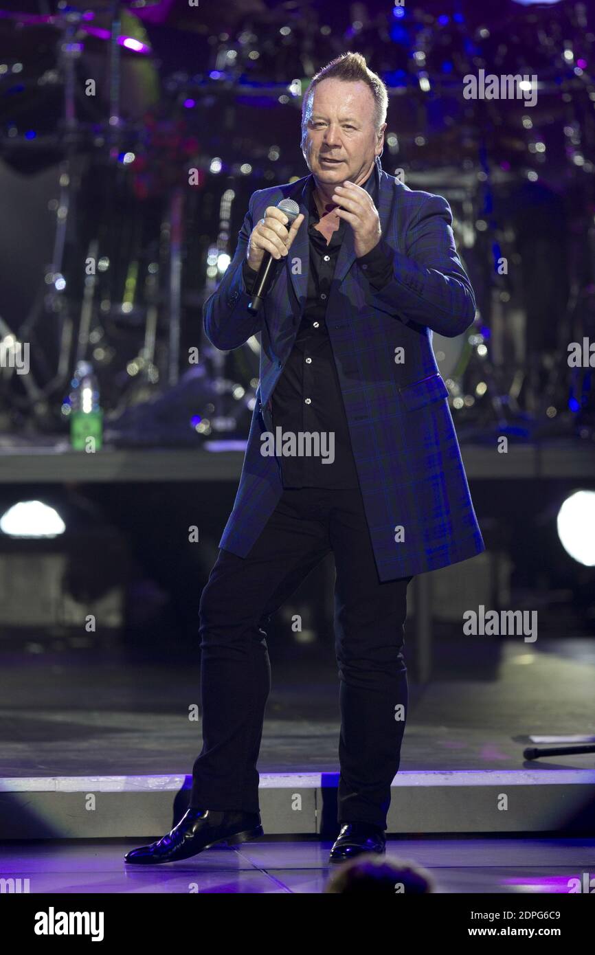 Scottish group Simple Minds, singer Jim Kerr performs at "Sporting