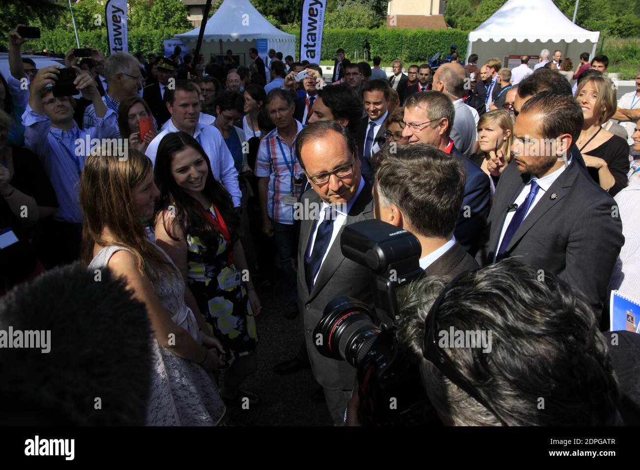 French President Francois Hollande along with Minister of Ecology, Sustainable Development and Energy Segolene Royal and Secretary of State for Regional Reform Andre Vallini during a visit to the company Air Liquide Advanced Technologies, a world leader in gases, technologies and services for industry and health, in Sassenage, near Grenoble, eastern France on August 20, 2015. Photo by Xavier Vila/Pool/ABACAPRESS.COM Stock Photo