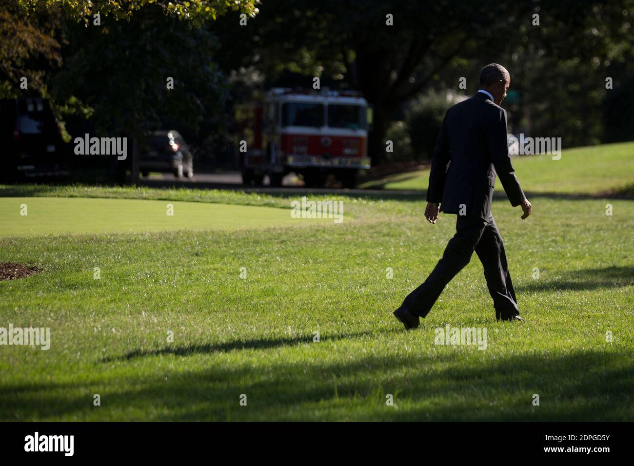 U.S. President Barack Obama walks toward the White House after landing on the South Lawn in Washington, DC, USA, on Tuesday, August 25. Obama pledged yesterday to provide incentives to support investments in renewable energy, saying the industry will thrive despite opposition by Republicans and fossil-fuel suppliers. Photo by Andrew Harrer/Pool/ABACAPRESS.COM Stock Photo