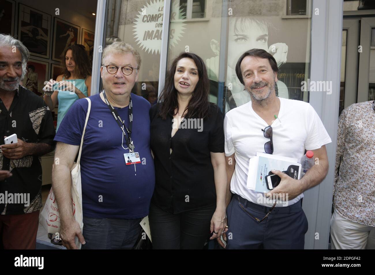 Dominique Besnehard, Beatrice Dalle and Jean-Hugues Anglade attending Beatrice Dalle photography signing at Remi Loca's shop during the 8th Angouleme Film Festival in Angouleme, France on August 29, 2015. Photo by Jerome Domine/ABACAPRESS.COM Stock Photo