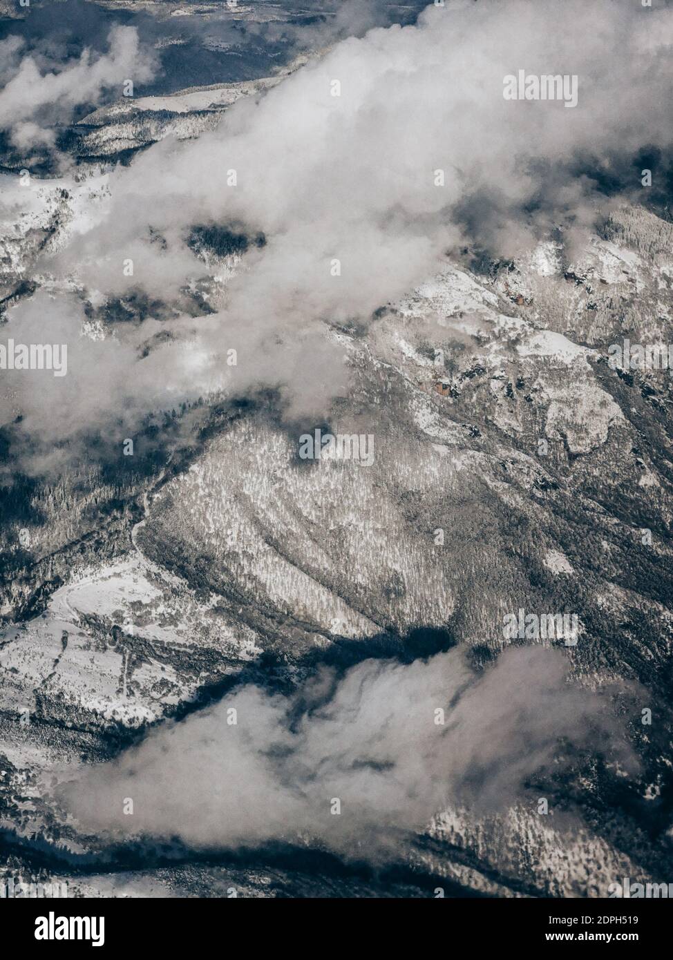 Aerial View Of Snowy Mountains Stock Photo - Alamy
