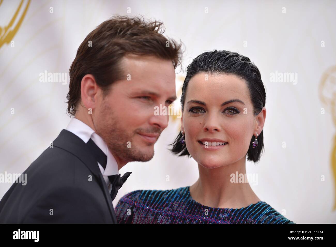 Peter Facinelli and Jaimie Alexander attend the 67th Emmy Awards at the