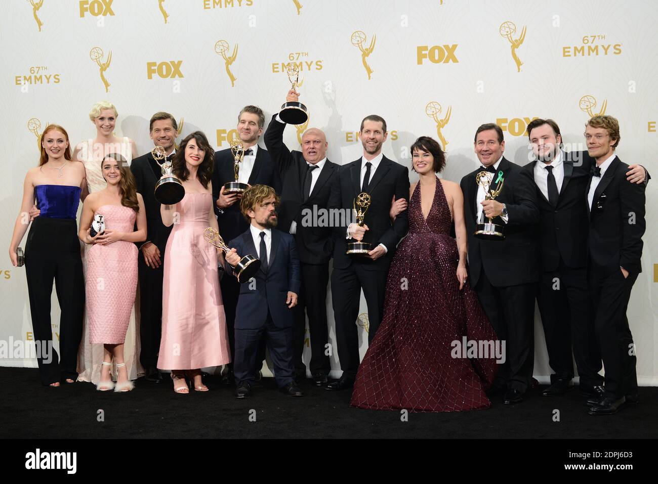 2015 Cast Peter Dinklage and the cast of Game of Thrones pose in the press room ...