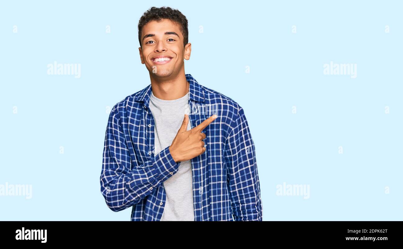 Young handsome african american man wearing casual clothes cheerful ...