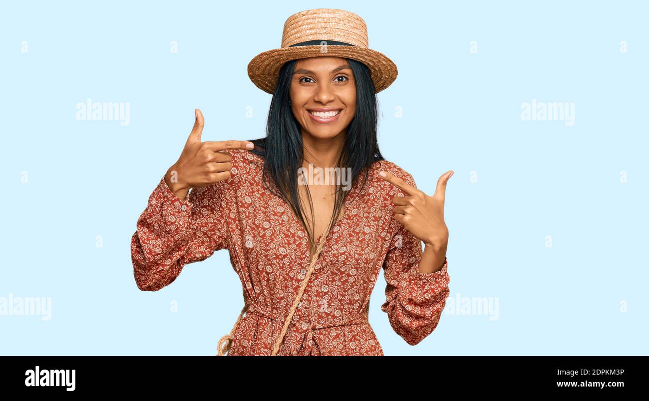 Young african american woman wearing summer hat smiling cheerful ...