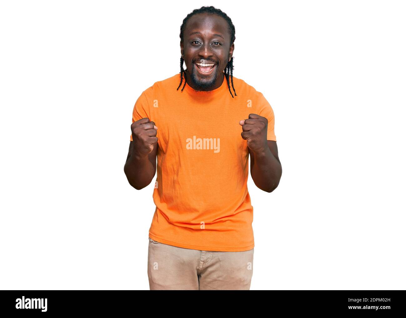 Handsome young african american man wearing casual clothes celebrating ...