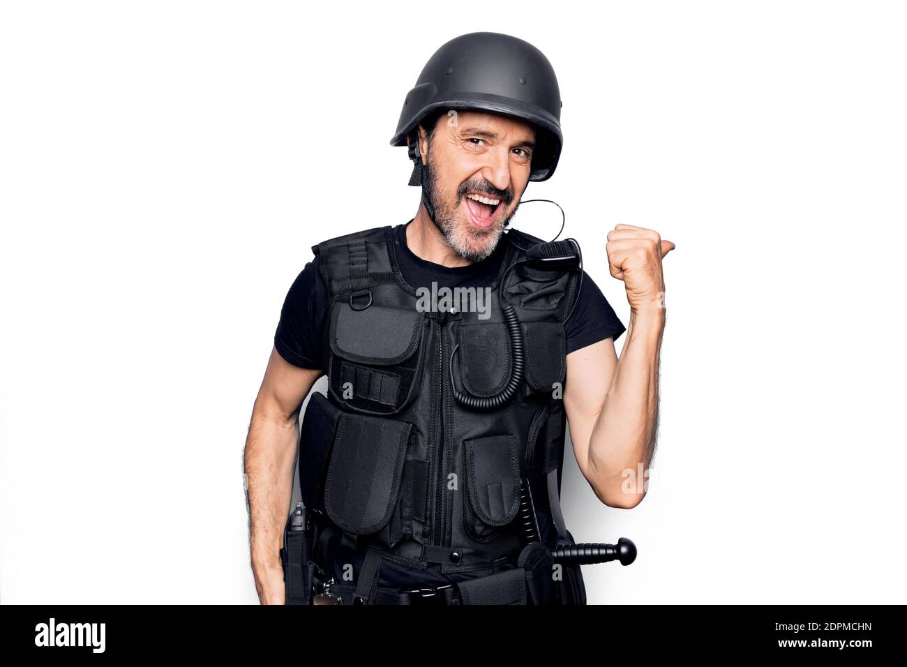 Middle age handsome policeman wearing police bulletproof vest and ...