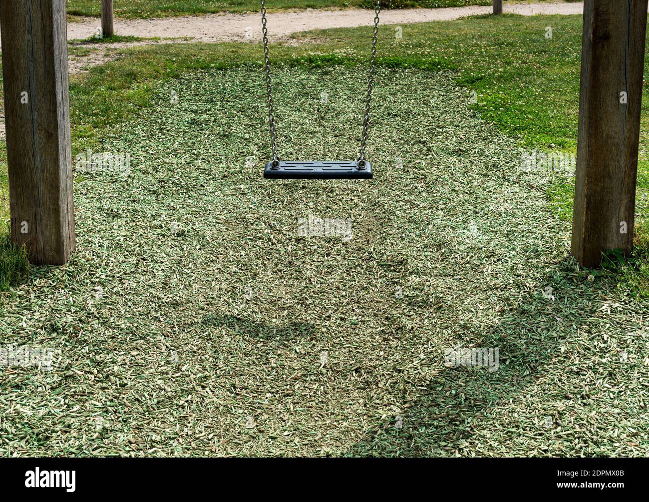 Empty Swing In The Park Stock Photo