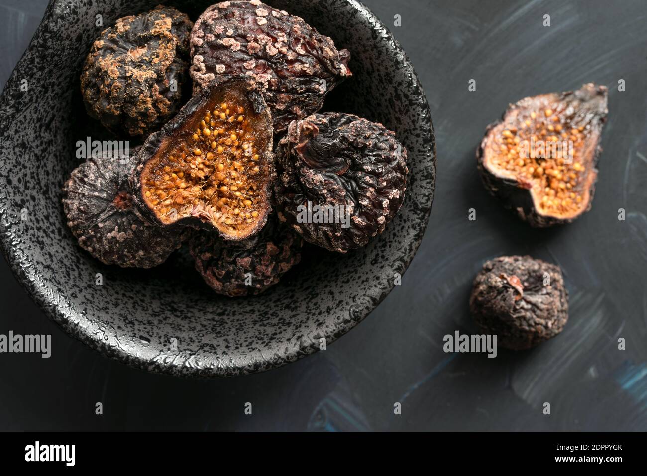 Dried Black Mission Figs in a Bowl Stock Photo Alamy