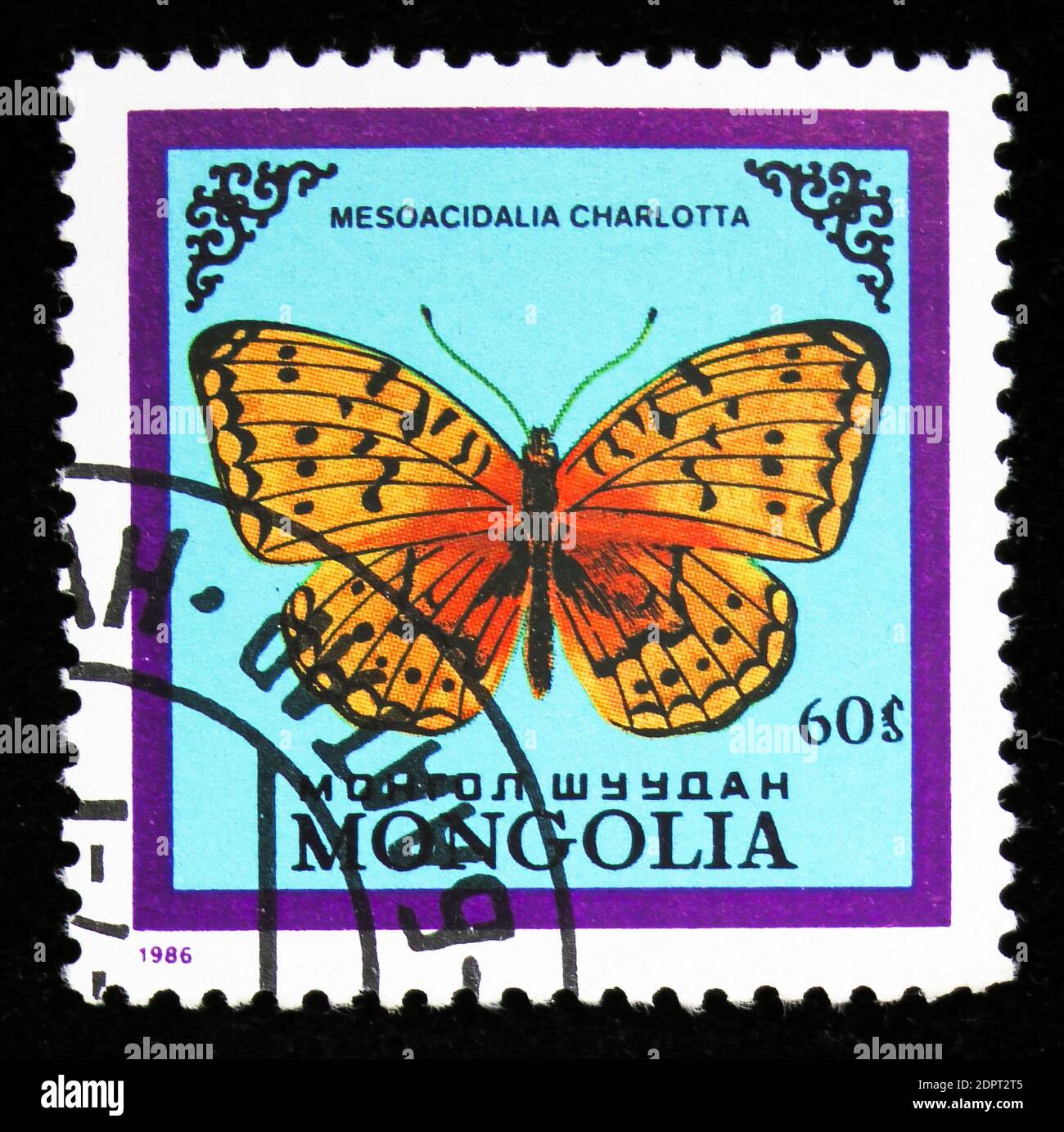 MOSCOW, RUSSIA - SEPTEMBER 26, 2018: A stamp printed in Mongolia shows Dark Green Fritillary (Mesoacidalia charlotta), Butterflies serie, circa 1986 Stock Photo