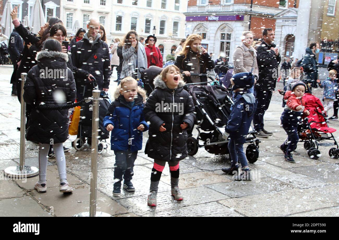 Children love the fake snow falling around themPeople enjoy the