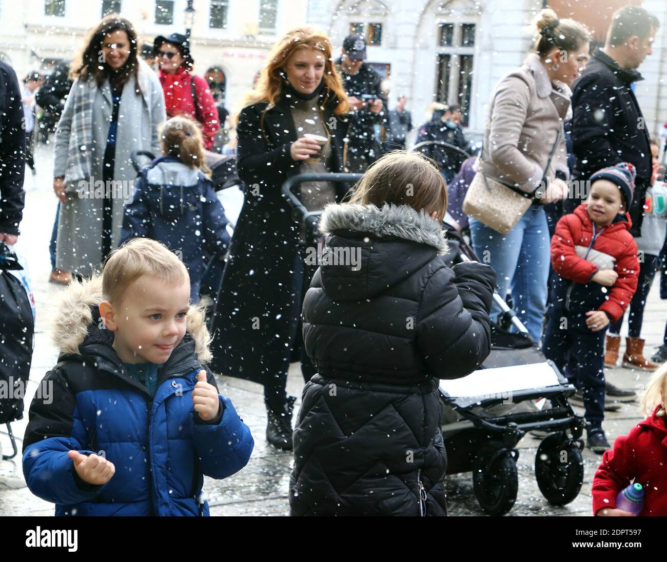 Children love the fake snow falling around themPeople enjoy the