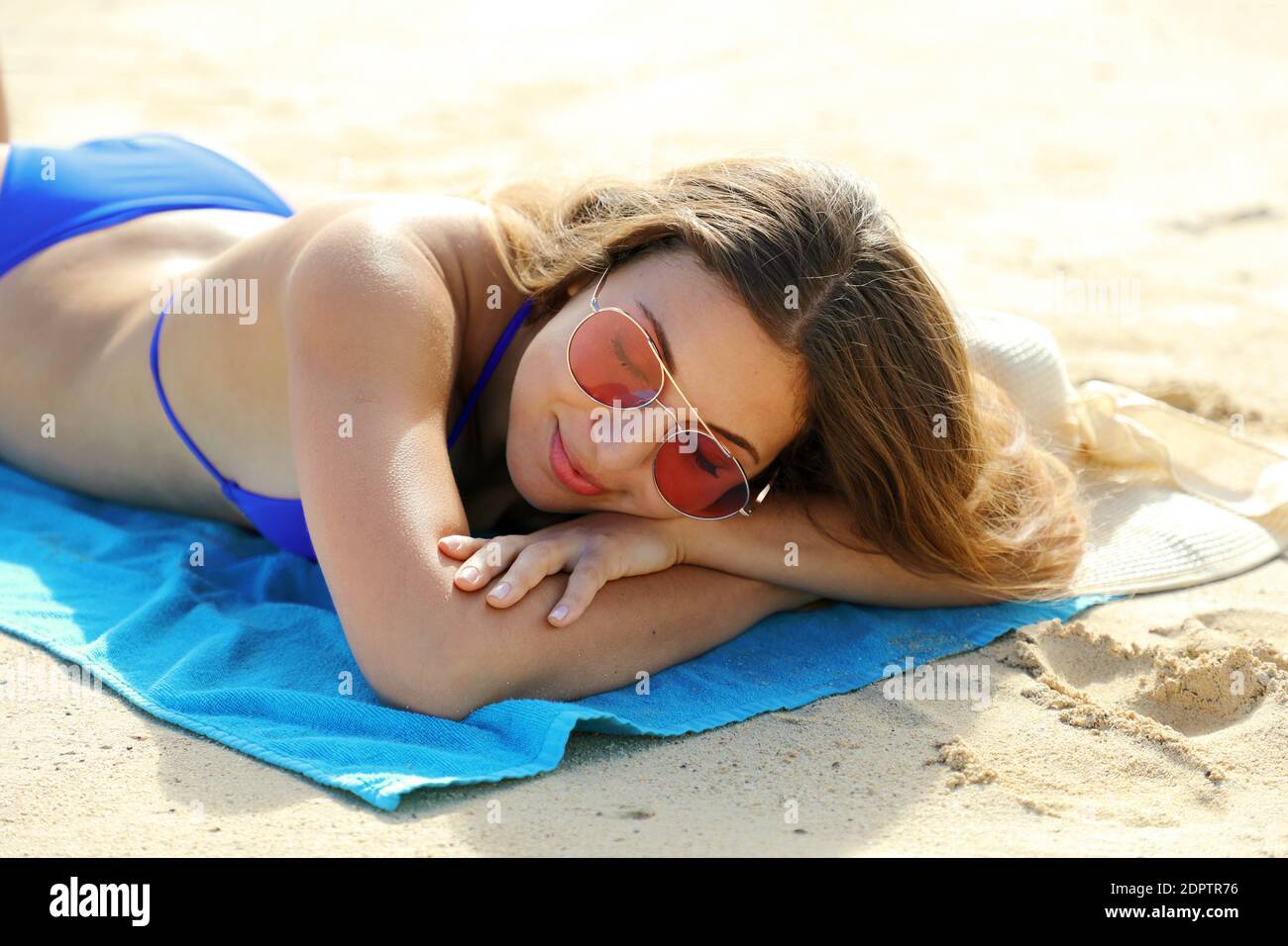 Beautiful Woman Wearing Bikini Lying Relaxing On Beach Stock Photo - Alamy