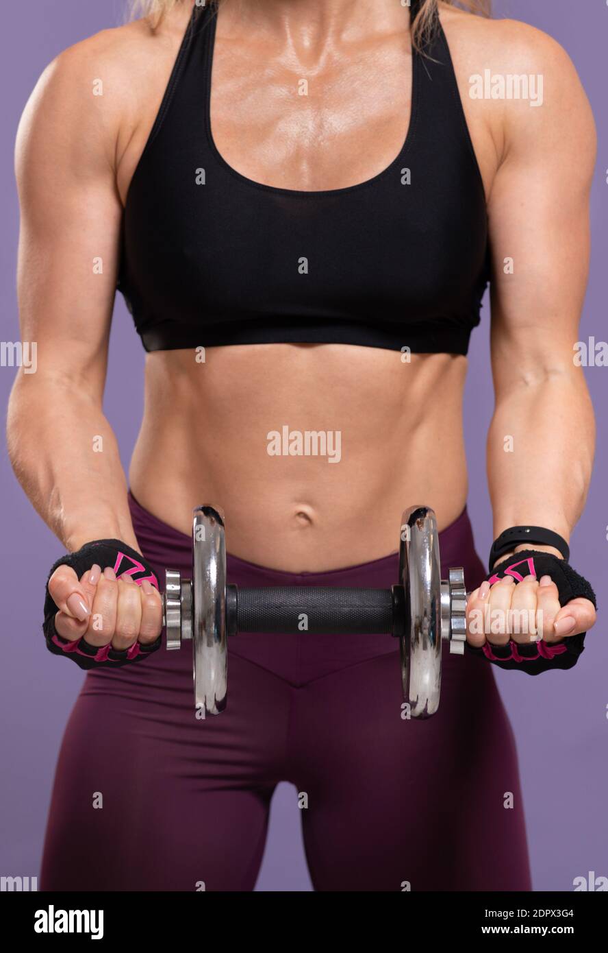 Strength Dripping Strength exercises for health during lockdown. Adult muscular wet lady ...