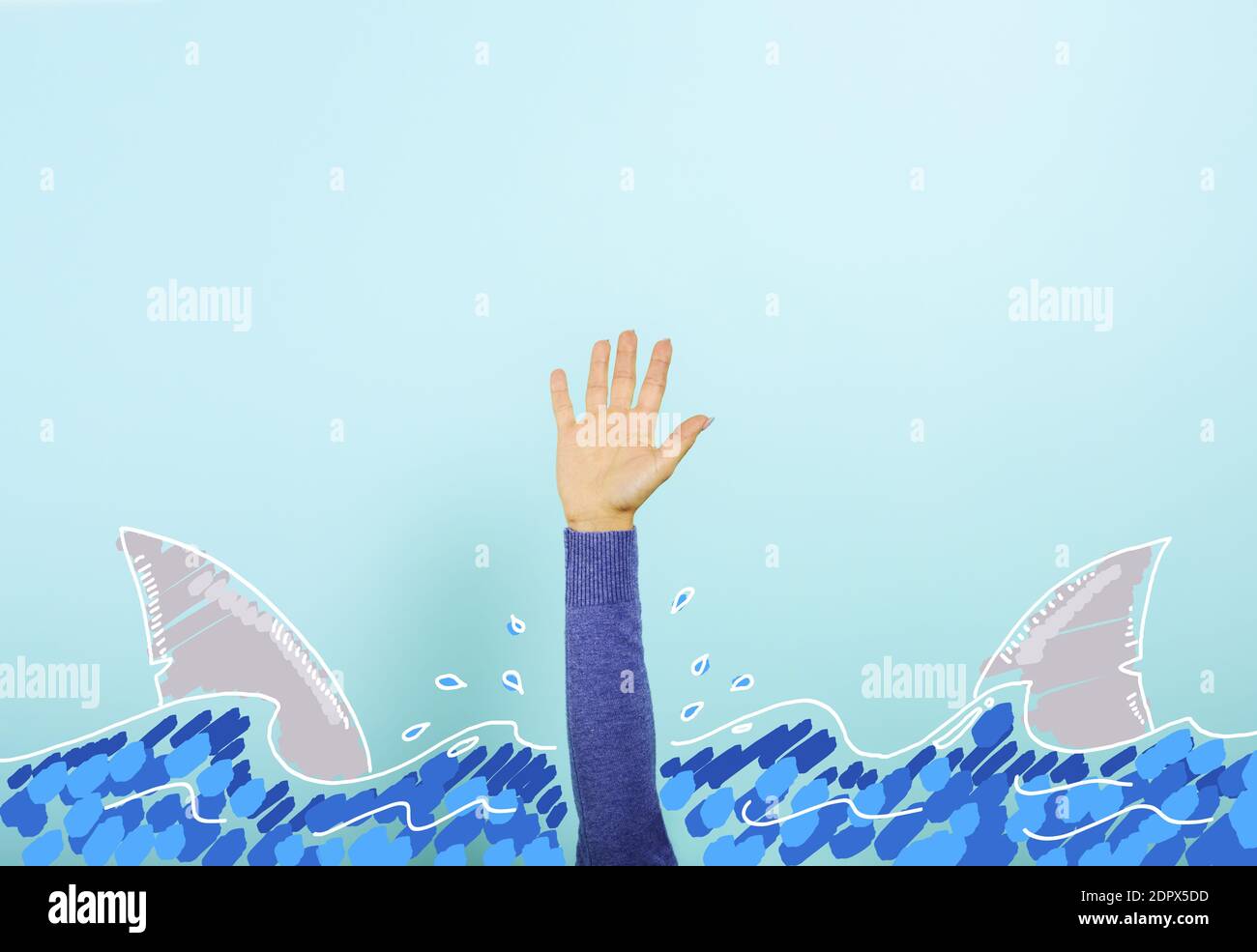 Person surrounded by sharks is drowning and needs help. concept of crisis and problem Stock Photo