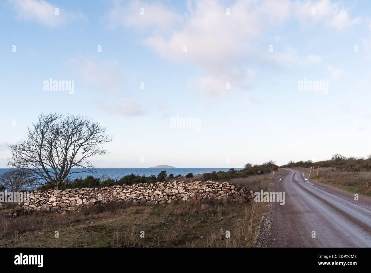 Coastal country road with view at the national park the island Bla Jungfrun in Sweden Stock Photo