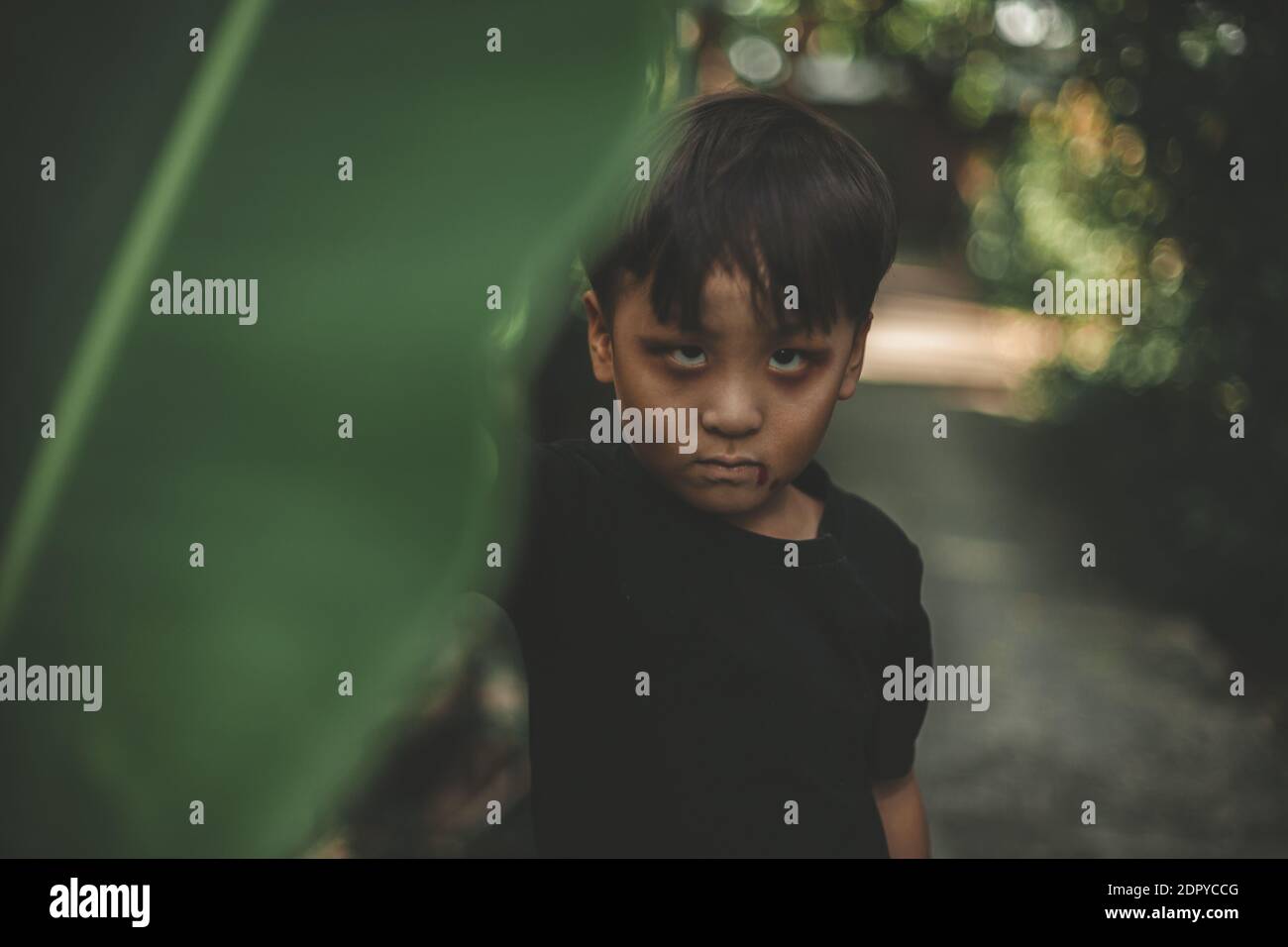 Portrait Of Cute Boy Standing Outdoors Stock Photo - Alamy