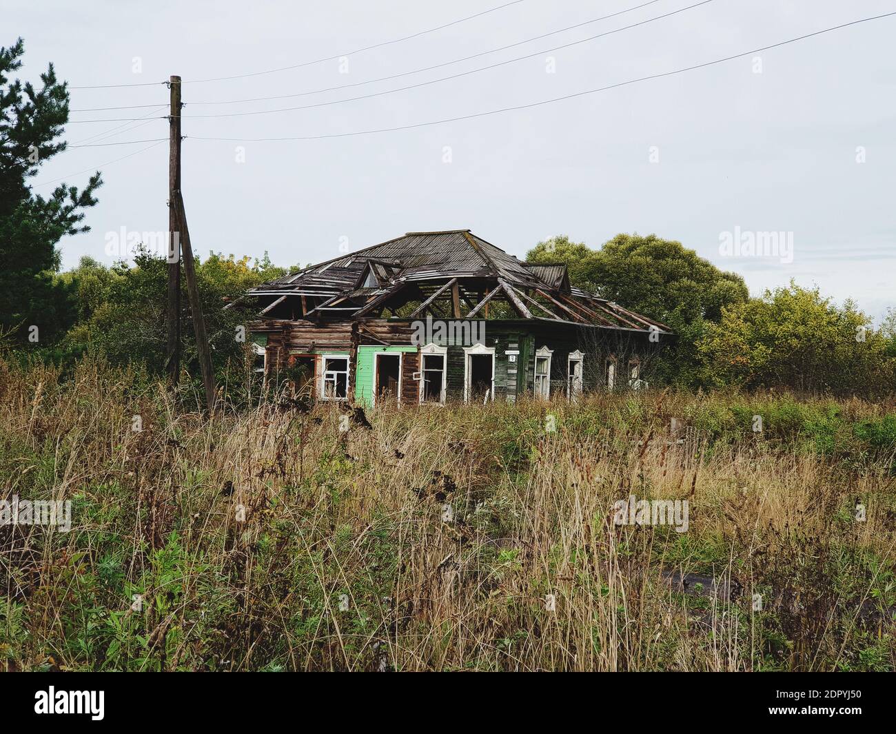 Abandoned House On Field Against Sky Stock Photo