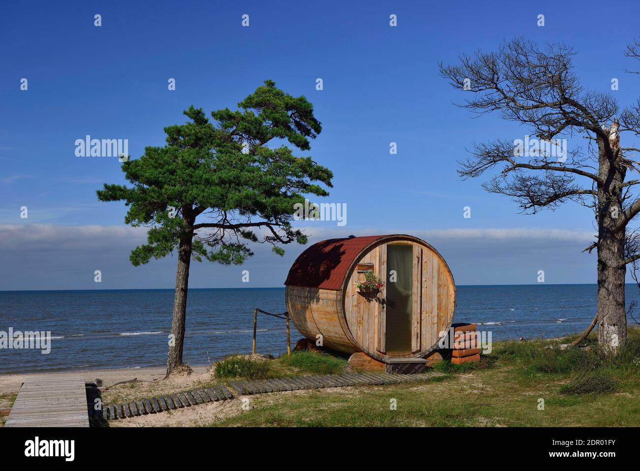 Wooden barrel as camping hut, Camping Saulesmajas, Kolkarags beach, Baltic Sea, Kurzeme, Kolka, Latvia Stock Photo