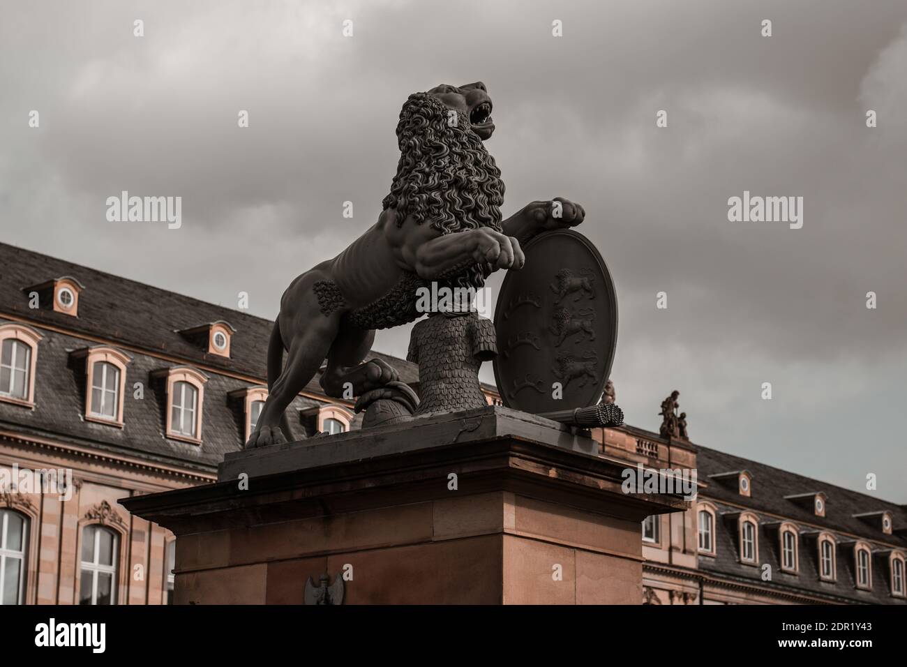 7 March 2020, Stuttgart, Germany - New Castle (Neues Schloss) on Caste Square (Schlossplatz),  sculpture of lion - symbol of Baden-Wuerttemberg Stock Photo