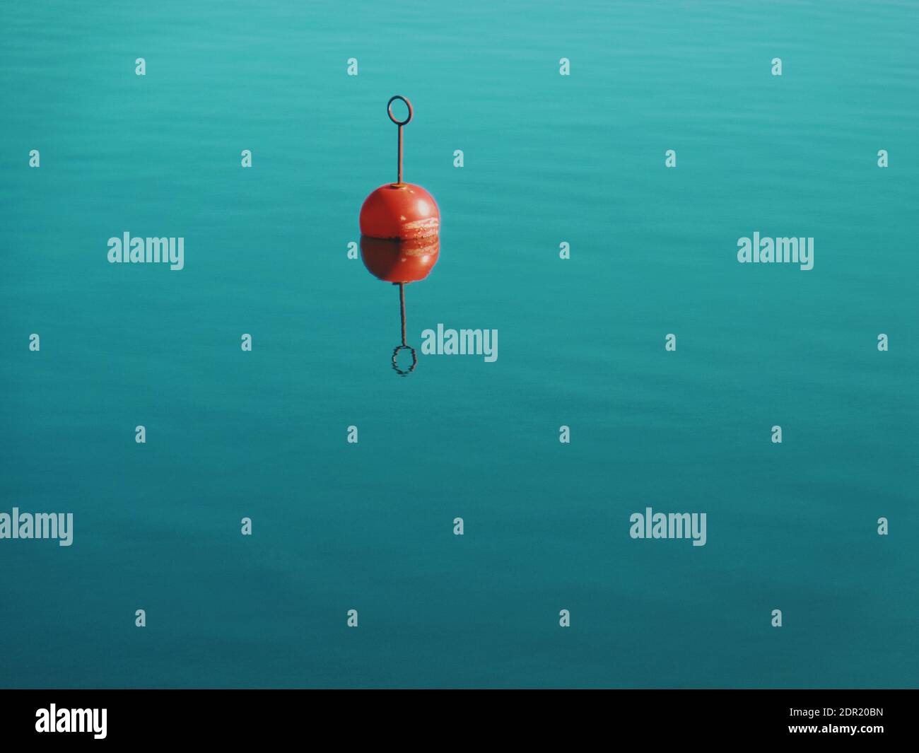 Red Buoy Floating On Water Stock Photo Alamy