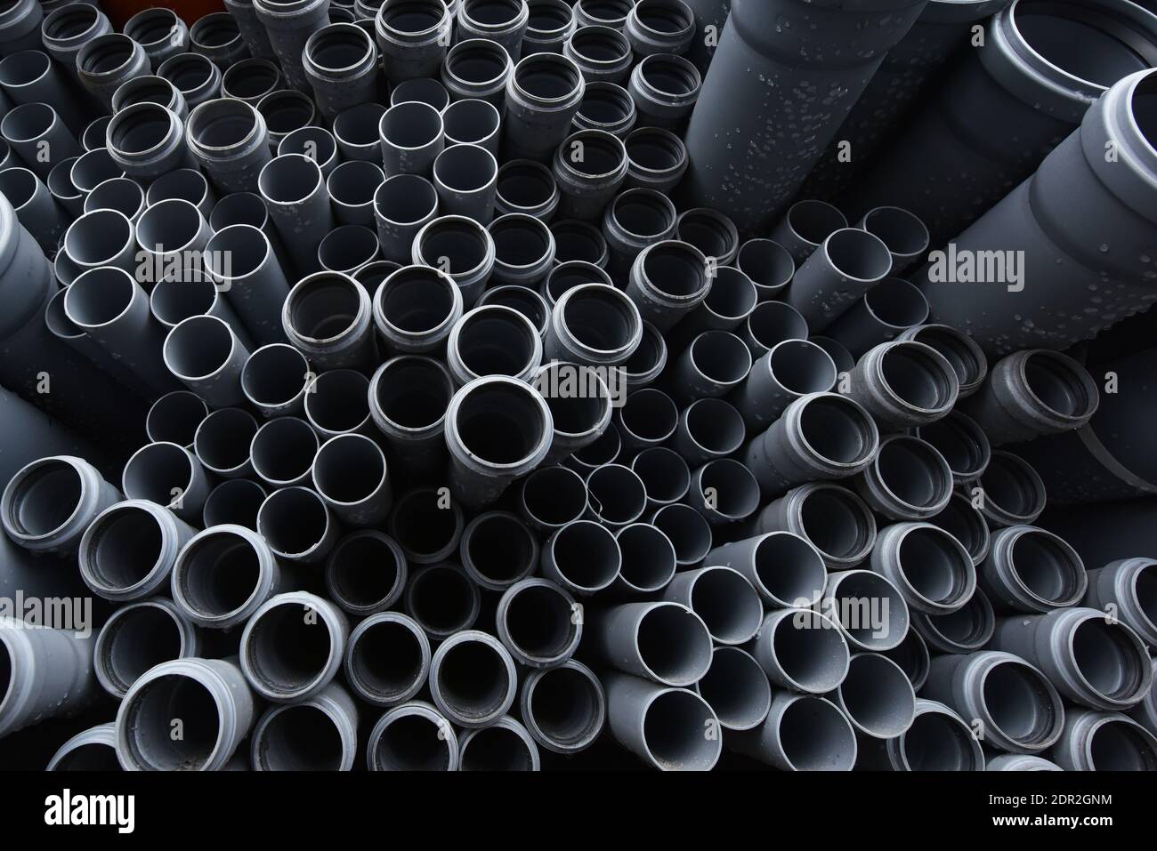 New gray plastic pipes for the sewage system. Stock Photo