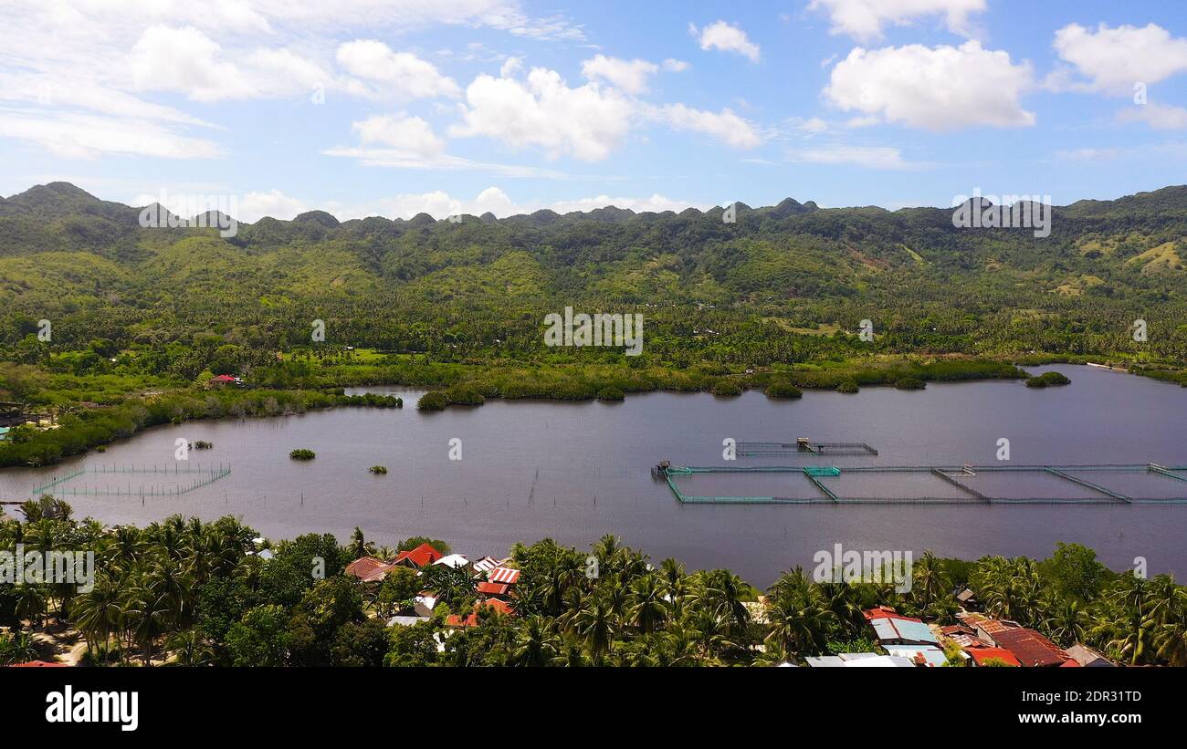 Aerial view of fish ponds for bangus, milkfish. Fish farm, top view