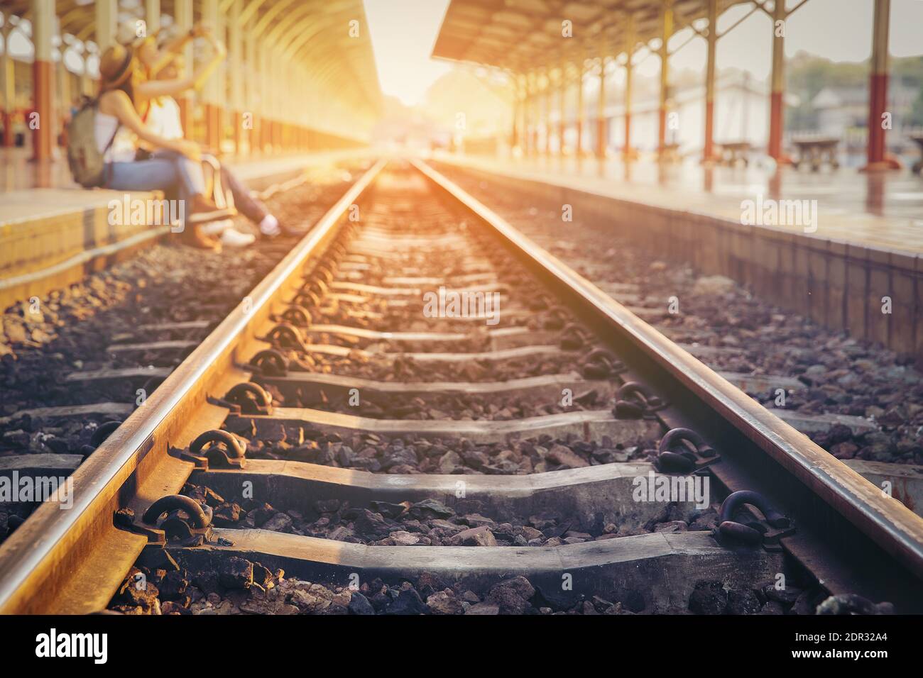 Sunlight Falling On Railroad Track At Platform Stock Photo Alamy