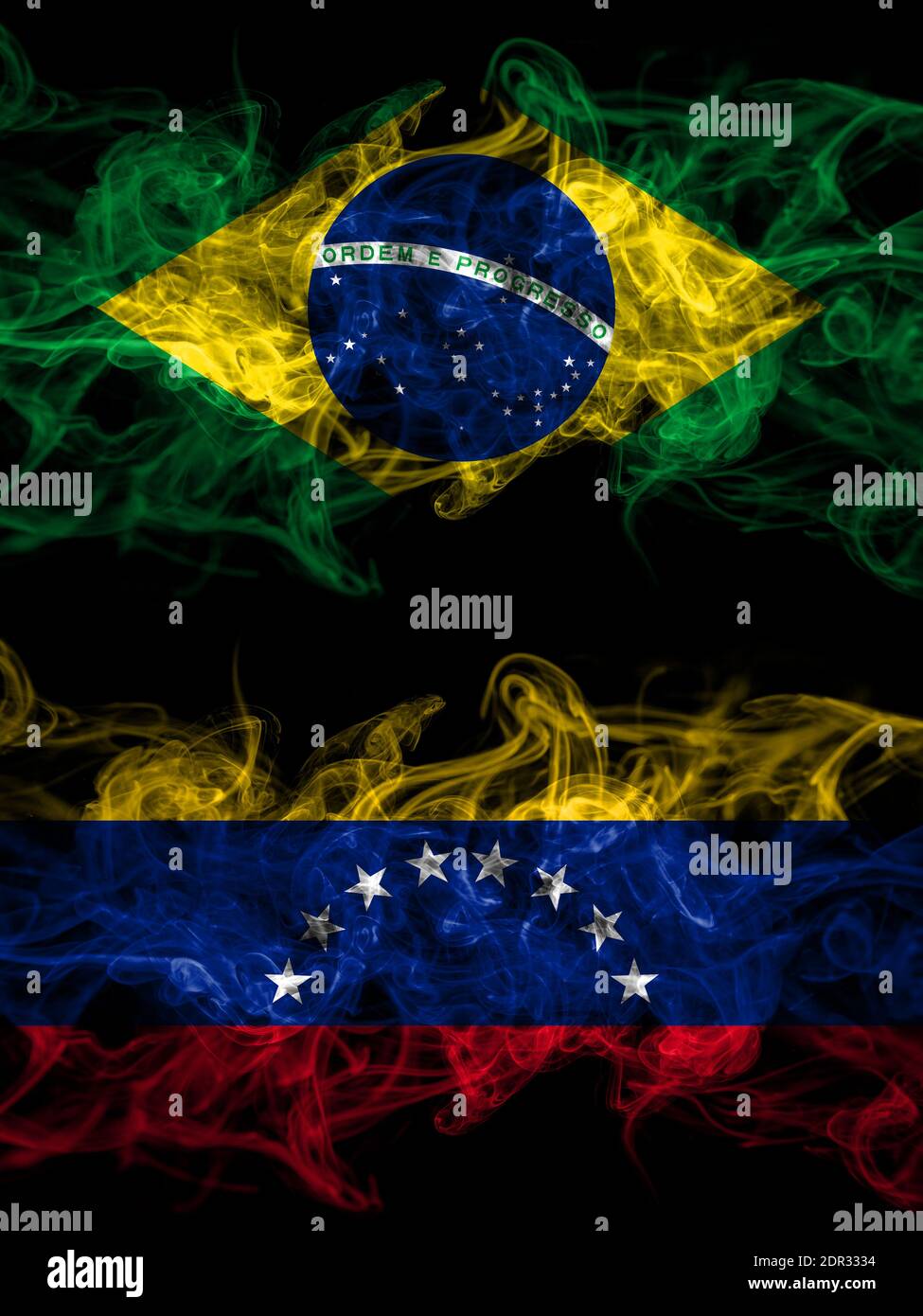 Brazil, Brazilian vs Venezuela smoky mystic flags placed side by side. Thick colored silky abstract smoke flags. Stock Photo