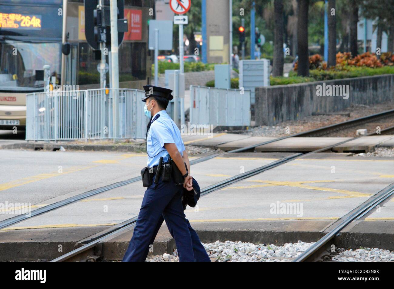 Hong Kong Police Force officers patrolling in Tin Shui Wai new town, Hong Kong (2020) Stock Photo