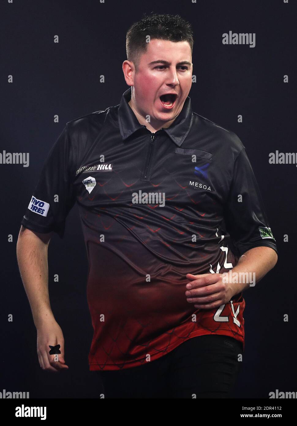 Nick Kenny celebrates during day six of the William Hill World Darts