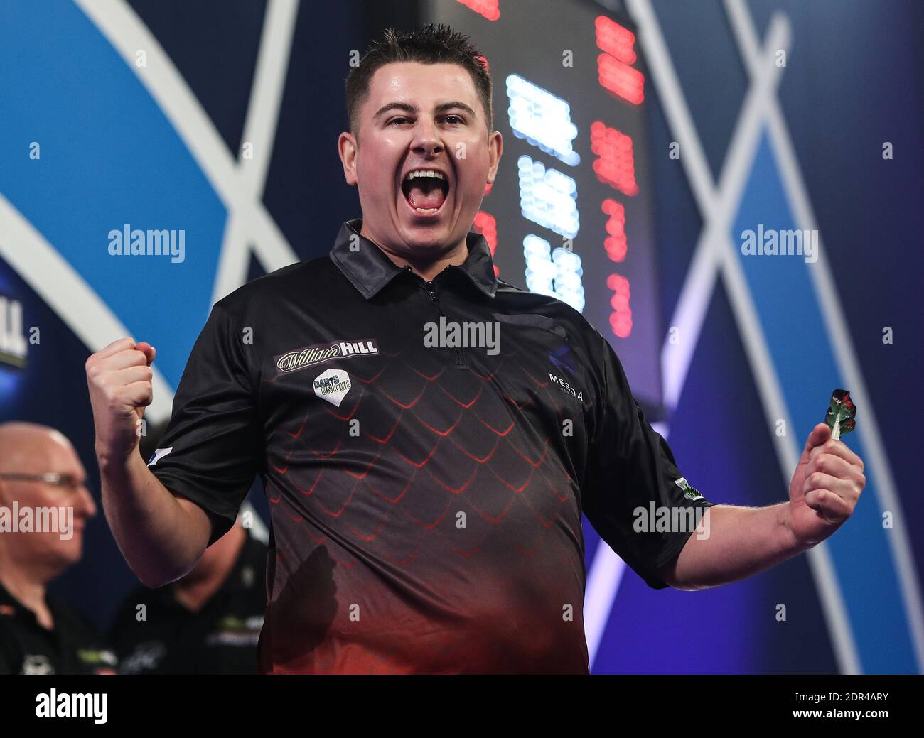 Nick Kenny celebrates after winning his match against Derk Telnekes